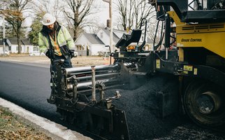 Asphalt overlay in progress on Donaghey Ave in Conway