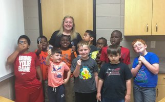 Bob & Betty Courtway Middle School families enjoyed the sweet side of recycling and sustainability education during their spring STEM Night. Recycling educator Whitney Reuschling walked participants through the creation of their own edible landfill cells.